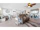 Open-concept living room flowing into the kitchen, great for entertaining at 7200 Sunshine Skyway S Ln # 4B, St Petersburg, FL 33711