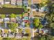 An overhead shot shows a community interspersed with canals, with most homes enjoying waterfront access and scenery at 7325 Calder Dr, New Port Richey, FL 34653
