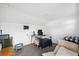 Bright home office featuring a desk, comfortable chair and neutral decor at 7325 Calder Dr, New Port Richey, FL 34653