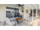 Outdoor patio seating area featuring furniture and view of backyard and pool at 7325 Calder Dr, New Port Richey, FL 34653
