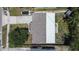 Overhead view of a well-maintained home featuring a combination roof and large backyard at 8497 137Th St, Seminole, FL 33776