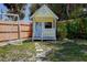 Backyard playhouse with personalized name detail in a private, fenced in backyard at 8497 137Th St, Seminole, FL 33776