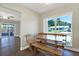 Charming dining nook with a wooden table and built-in seating, bathed in natural light at 8520 Woodall Ct, Tampa, FL 33615