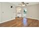 The bright main bedroom features hardwood floors and a vanity with abundant natural light at 8520 Woodall Ct, Tampa, FL 33615