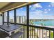 Enjoy beautiful views of the Intracoastal Waterway from this balcony with seating, perfect for relaxing or entertaining at 9425 Blind Pass Rd # 802, St Pete Beach, FL 33706