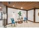 Welcoming lobby area with tiled floors, wooden trim and comfortable seating at 9425 Blind Pass Rd # 802, St Pete Beach, FL 33706