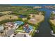 Expansive waterfront property features a pool and private dock for easy water access and recreation at 945 Bunker View Dr, Apollo Beach, FL 33572