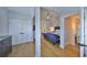 Bright bedroom with ensuite bath, closet, and hardwood floors at 945 Bunker View Dr, Apollo Beach, FL 33572