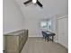 Bedroom features vaulted ceilings, a ceiling fan and neutral paint with shuttered windows at 945 Bunker View Dr, Apollo Beach, FL 33572
