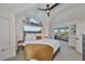 Bedroom with bright window and a seating area with a view at 945 Bunker View Dr, Apollo Beach, FL 33572