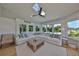 Spacious living room with many windows and a skylight for natural light at 945 Bunker View Dr, Apollo Beach, FL 33572