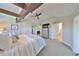 Spacious main bedroom with a view into the bathroom, features a ceiling fan and recessed lighting at 945 Bunker View Dr, Apollo Beach, FL 33572
