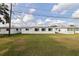 A sprawling backyard featuring well-maintained lawn and multiple units at 9511 45Th N St # 9511, Pinellas Park, FL 33782