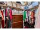 Walk-in closet with built-in shelving, ample storage space, and well-organized layout at 9511 45Th N St # 9511, Pinellas Park, FL 33782