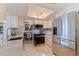 Updated kitchen featuring stainless steel appliances, mosaic backsplash, and modern lighting at 9511 45Th N St # 9511, Pinellas Park, FL 33782