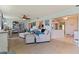 Inviting living area featuring hardwood floors, an open layout, and abundant natural light at 9511 45Th N St # 9511, Pinellas Park, FL 33782
