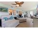 Bright living room with an open floor plan that provides seamless flow from kitchen to living spaces at 9511 45Th N St # 9511, Pinellas Park, FL 33782