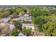 A high aerial shows the location of the home within the neighborhood at 10011 N Annette Ave, Tampa, FL 33612