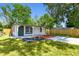 Charming single-story home with new landscaping, a freshly painted exterior, and a modern driveway at 10011 N Annette Ave, Tampa, FL 33612