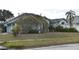 Charming one-story home with lush landscaping and a well-maintained lawn in a desirable location at 10223 Tarragon Dr, Riverview, FL 33569