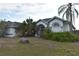 Inviting single Gathering home with a well-manicured lawn and lush landscaping in a quiet neighborhood at 10223 Tarragon Dr, Riverview, FL 33569