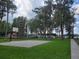 Outdoor basketball court and covered picnic area for community gatherings and recreation at 10502 Atlee St, New Port Richey, FL 34654