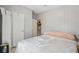 Neutral bedroom boasts ample closet space for storage and organization solutions at 10502 Atlee St, New Port Richey, FL 34654