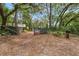 A gated entrance with privacy screening welcomes you to the property with room to park at 10502 Atlee St, New Port Richey, FL 34654