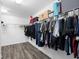 Spacious walk-in closet with ample storage and organization options for clothes and accessories at 11760 Winterset Cove Dr, Riverview, FL 33579