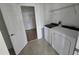 A laundry room featuring new appliances and an attached closet at 11839 Cross Vine Dr, Riverview, FL 33579
