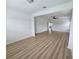 Bright living room showcasing the light wood floors at 11839 Cross Vine Dr, Riverview, FL 33579