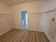 Spacious walk-in closet with laminate flooring and wire shelving at 11839 Cross Vine Dr, Riverview, FL 33579