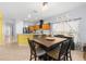 Dining area with natural light offers a cozy space for enjoying meals with modern light fixture at 12008 Fern Blossom Dr, Gibsonton, FL 33534