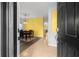 Open entryway featuring tile flooring, a dining area, and views into the home at 12008 Fern Blossom Dr, Gibsonton, FL 33534