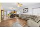 Open floorplan combining the kitchen, dining area, and living room creates a welcoming atmosphere at 12008 Fern Blossom Dr, Gibsonton, FL 33534