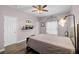 Main bedroom with wood-look floors and ensuite bath offer a private retreat at 12008 Fern Blossom Dr, Gibsonton, FL 33534