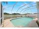 The pool is screened and surrounded by an expansive patio, perfect for entertaining at 12008 Fern Blossom Dr, Gibsonton, FL 33534