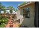 A side view of the backyard, shed and fence at 1211 E Park Cir, Tampa, FL 33604