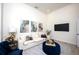 Cozy living room with recessed lighting, plush seating, and decorative artwork at 12408 Seabrook Dr, Tampa, FL 33626