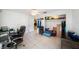 Spacious office space featuring tiled floors and an open closet at 135 Rodney Ct, Palm Harbor, FL 34684