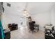 Bright home office with tiled floors, a ceiling fan, and abundant natural light at 135 Rodney Ct, Palm Harbor, FL 34684