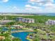 Overhead shot of the condominium neighborhood, with multiple lakes, golf courses, and pristine landscaping at 14820 Rue De Bayonne # 208, Clearwater, FL 33762