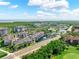 Gorgeous aerial view of condos with lakes, and golf course surrounded by nature at 14820 Rue De Bayonne # 208, Clearwater, FL 33762