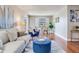 Cozy living space showcasing hardwood floors, elegant furniture, and a relaxing ambiance at 14820 Rue De Bayonne # 208, Clearwater, FL 33762