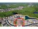 An aerial view of the neighborhood and nearby forest and lakes at 1723 Whitewillow Dr, Wesley Chapel, FL 33543