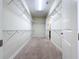Large walk-in closet with ample storage space and shelving at 1723 Whitewillow Dr, Wesley Chapel, FL 33543