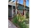 Exterior view of the Building X Clubhouse with attractive flora and welcoming entrance at 1799 N Highland Ave # 170, Clearwater, FL 33755