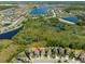 Aerial view features the home's location in a neighborhood with lake access at 19487 Roseate Dr, Lutz, FL 33558