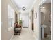 Inviting foyer featuring tile floors and natural light at 19487 Roseate Dr, Lutz, FL 33558