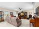 Spacious living room featuring tile floors and natural light at 19487 Roseate Dr, Lutz, FL 33558